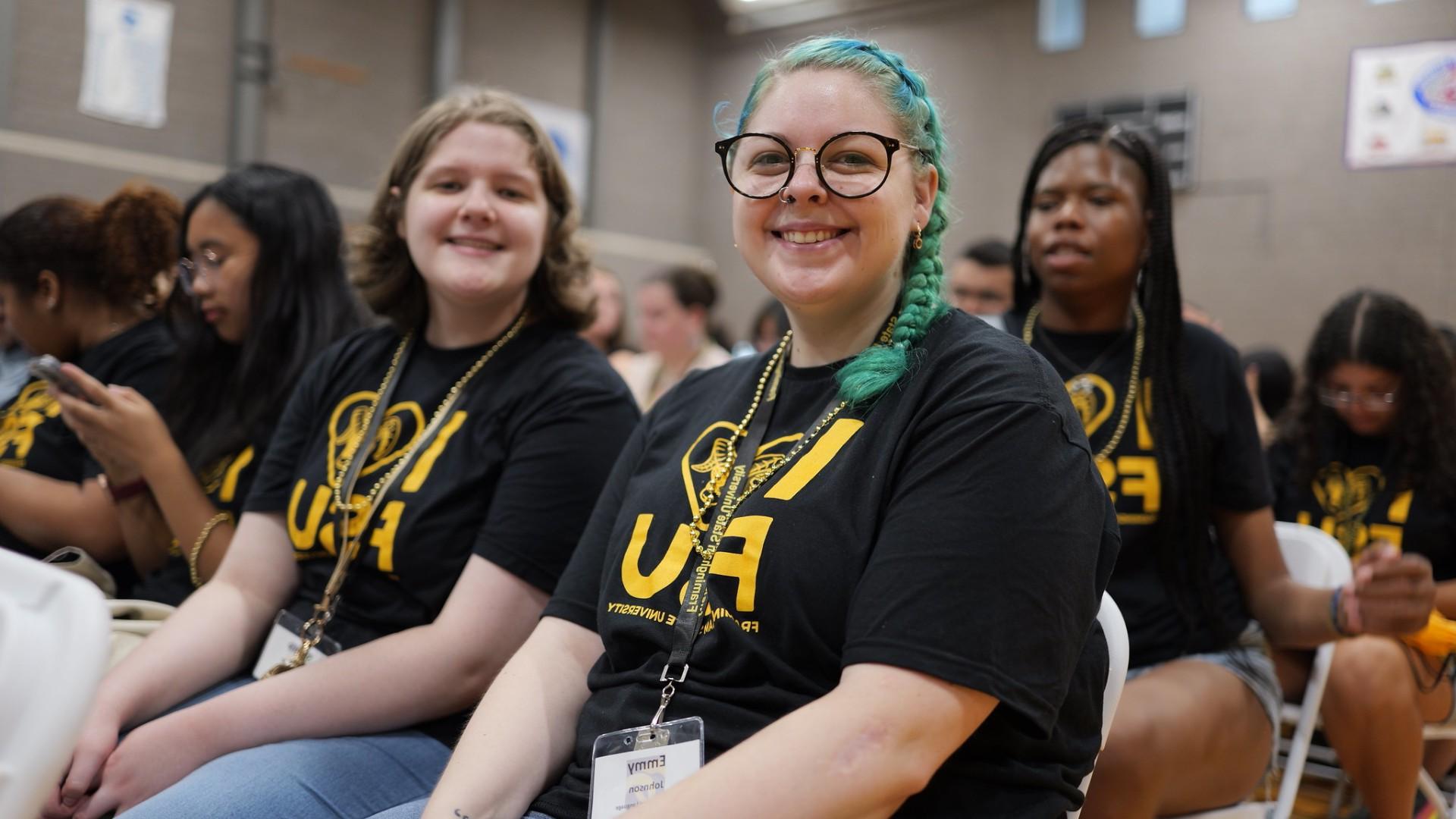 Students sitting in gymasium